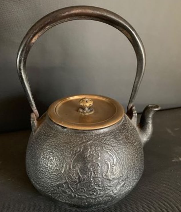 Meiji Period Tetsubin: Meiji Period Tetsubin with pebbled finish with raised Islamic medallion, and bronze lid. measures to handle app 9.5 inches