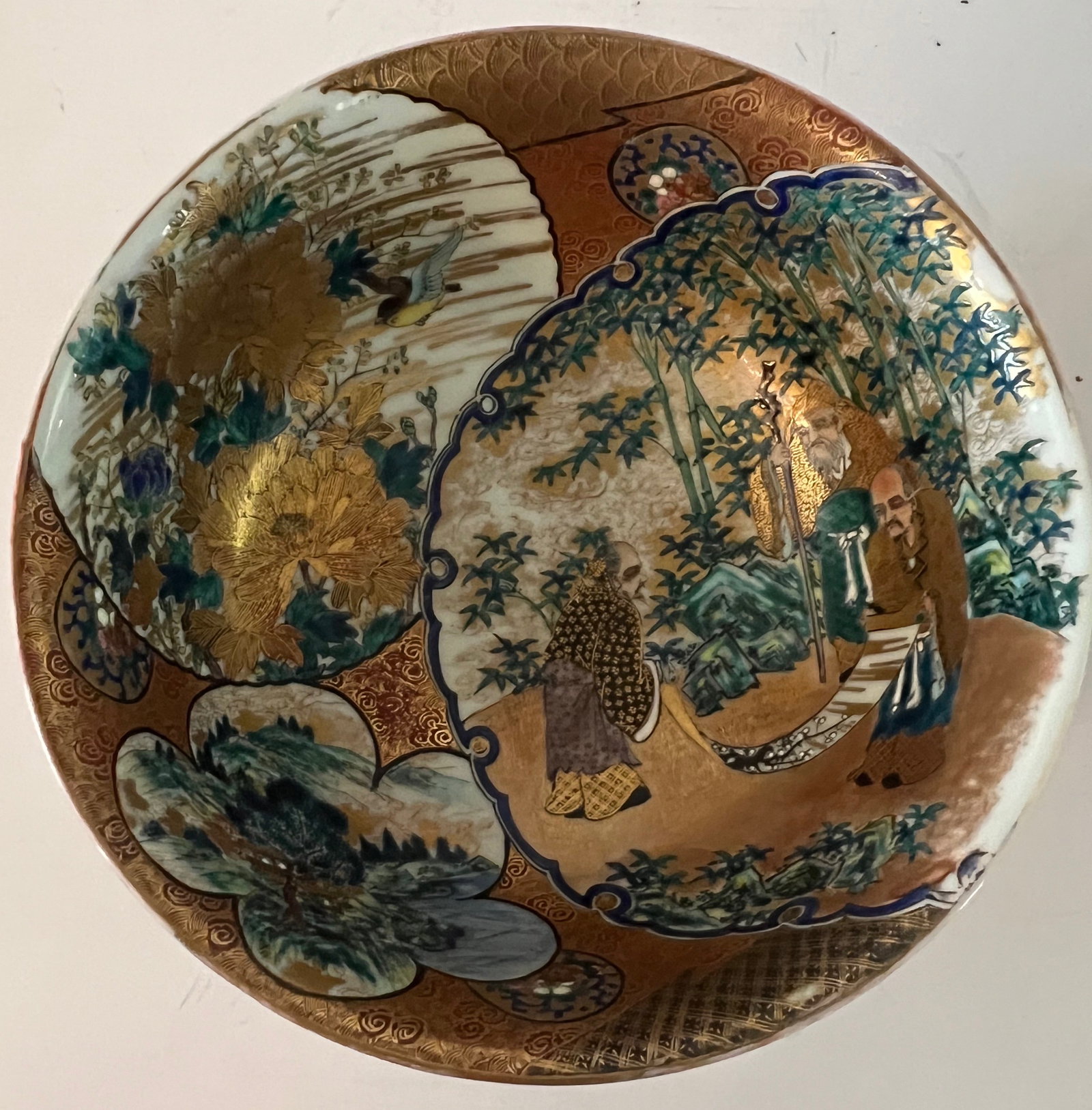 Exceptional Kutani Double-Walled Bowl, Meiji Period.: Exceptional Kutani bowl with very fine and intricate enamel painting. It is a very heavy piece of porcelain and is a truly remarkable work of art. The bowl has a double wall showing on the exterior. D