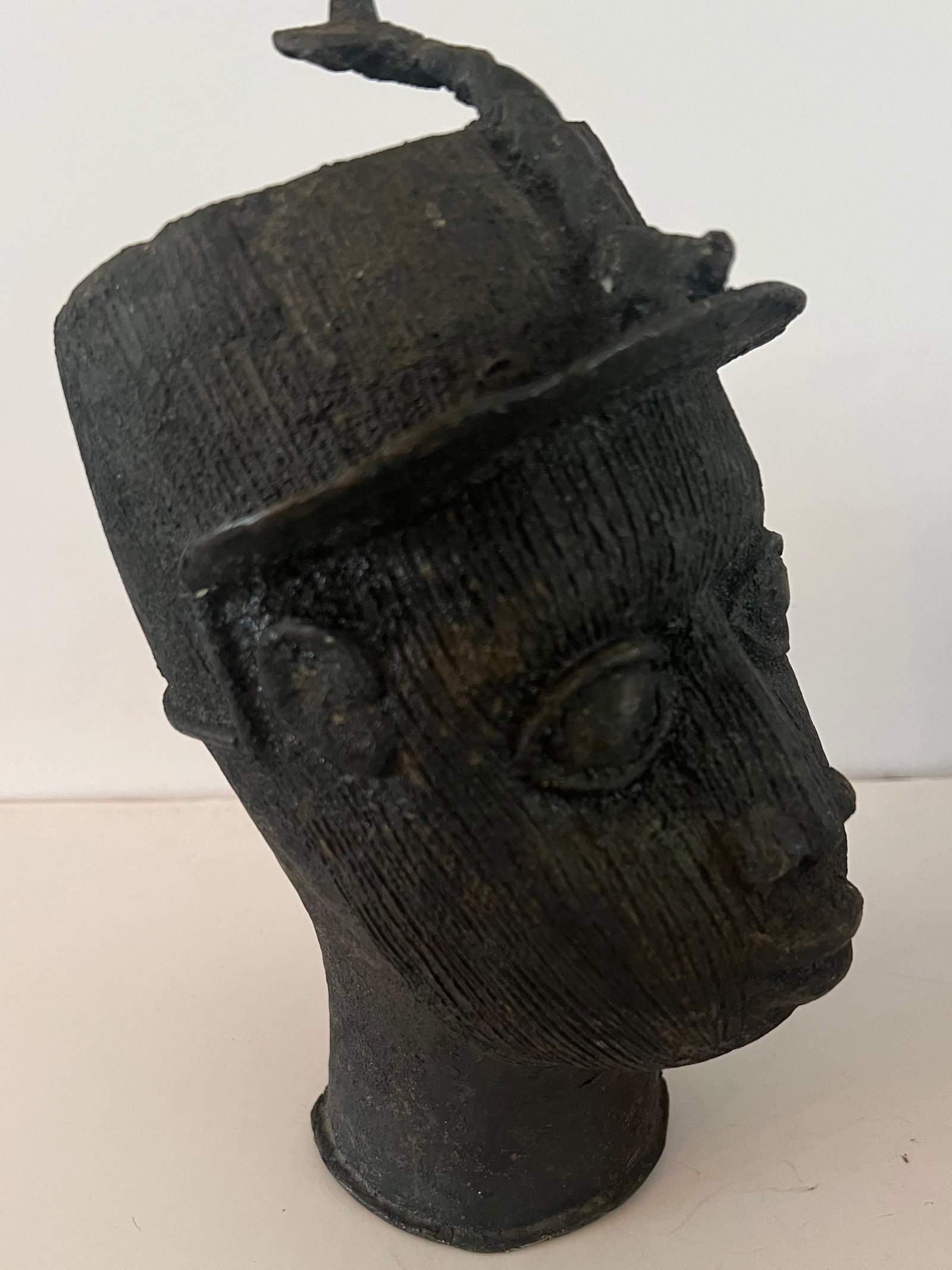 Benin Bronze Head of King Oba: The extraordinary bronzes of the Benin kingdom in what is now Nigeria exhibit a virtuosity and sophistication of style that has astonished the Western world since they were visited in the 15th Century
