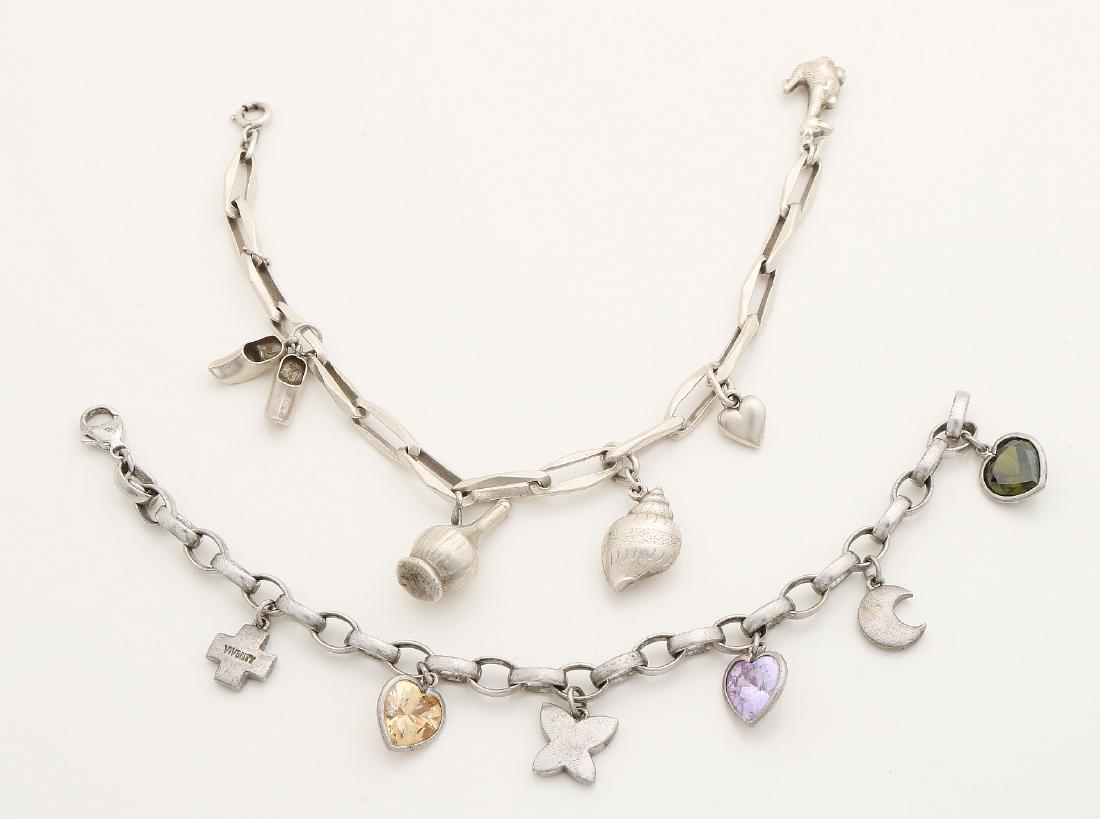 Two silver charm bracelets, 925/000, close for ever: Two silver charm bracelets, 925/000, close for ever bracelet with 5 silver charms and an oval jasseron bracelet with 3 charms with zirconia and 3 silver charms, viventy ". Total ca 41 gram. In good co