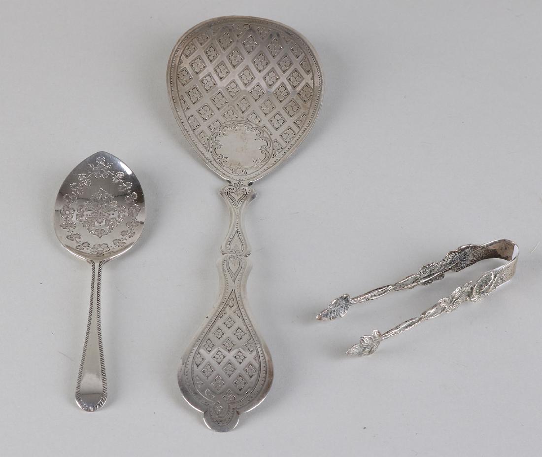 Three pieces of silver, a small cube bar, 835/000, with: Three pieces of silver, a small cube bar, 835/000, with roses, 13 cm, a cake server, 835/000, with a pear-shaped bowl and a contoured stem, richly decorated with diamond-engraved engraving with a flor