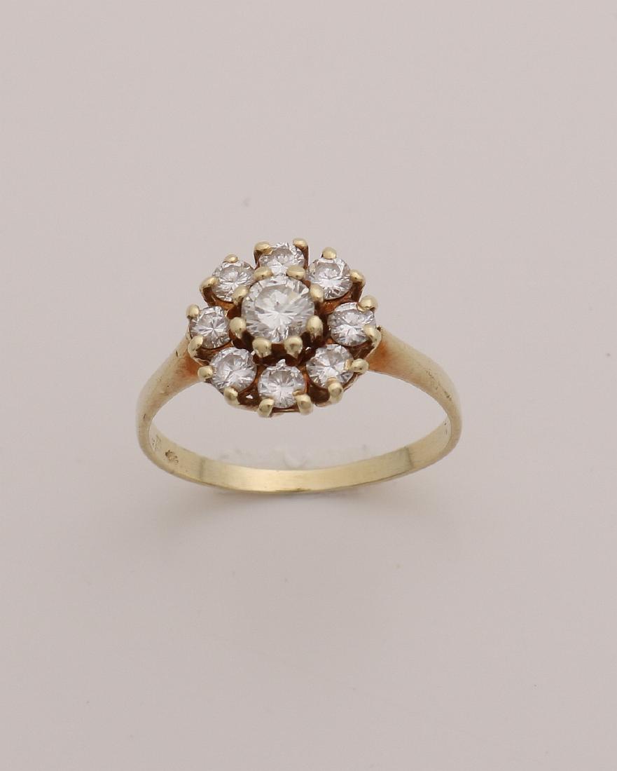 Gold rosette ring, 585/000, with diamond. Ring with a: Gold rosette ring, 585/000, with diamond. Ring with a rosette set with 9 brilliant cut diamonds. total approximately 0.75 ct. VSI / G ø rosette 10 mm. ø 53. approximately 2.3 grams. In good conditio