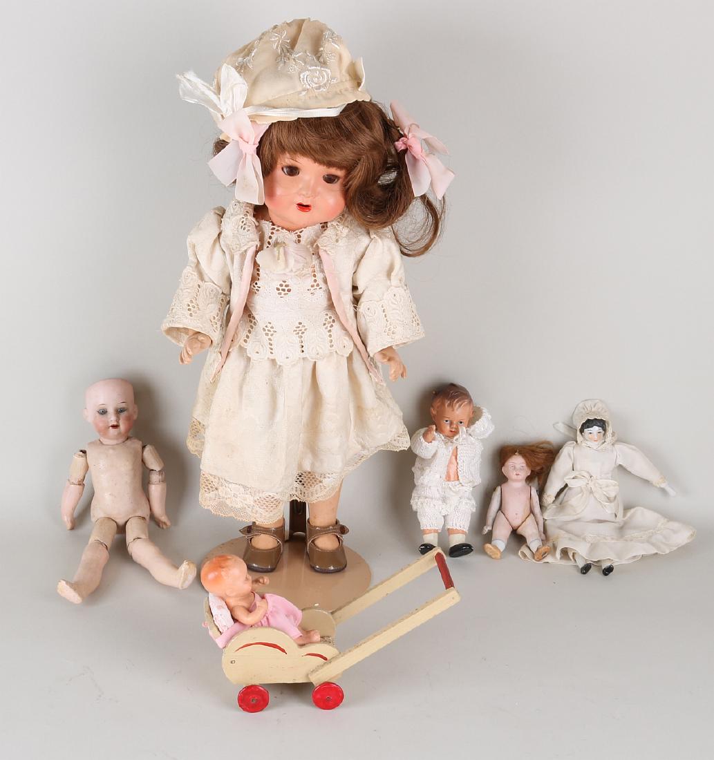 Six antique German dolls. 1. Articulated porcelain doll Jun 29, 2019