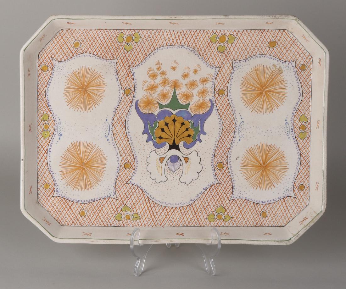 Antique Gouda plate tray. Decor Héne. Painter PN Nr.: Antique Gouda plate tray. Decor Héne. Painter PN Nr. 4157. Circa 1915. Art Nouveau. Dimensions: 3 x 36 x 28 cm. In good condition.