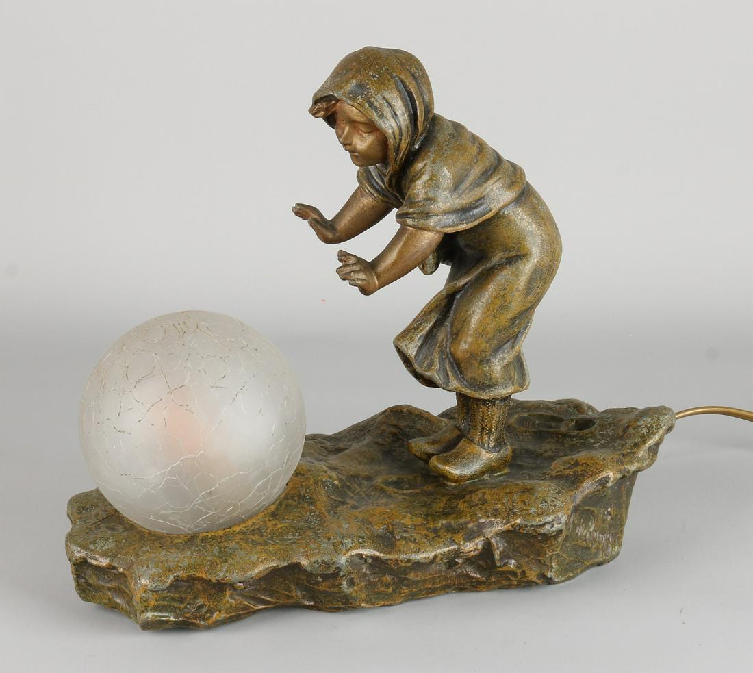 Antique table lamp signed with ice crack glass.: Antique table lamp signed with ice crack glass. Approximately 1910. Composition metal, bronze-colored patina. Size: 25 x 28 x 13 cm. In good condition.