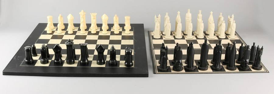 Two chess games Peter Ganine U.S.A. One times imitation: Two chess games Peter Ganine U.S.A. One times imitation ivory Figures + chess board made of cardboard. One time imitation ivory figures with wooden chessboard. Size: 12 x 40 x 40 cm. / 11 x 50 x 50 cm