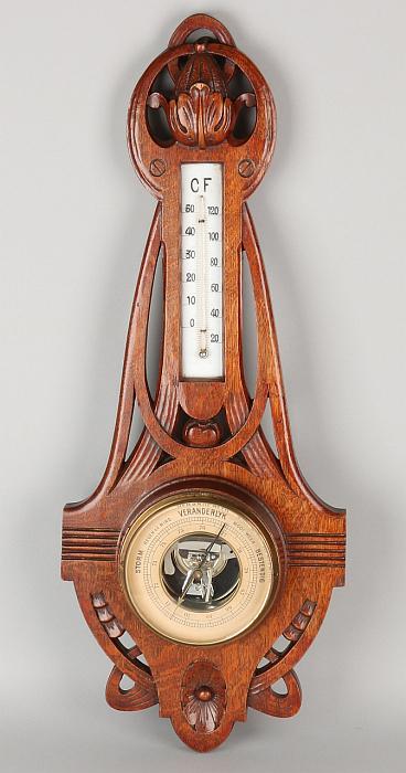Antique oak Nouveau barometer. Circa 1915. Dimensions:: Antique oak Nouveau barometer. Circa 1915. Dimensions: 67 cm. In good condition.