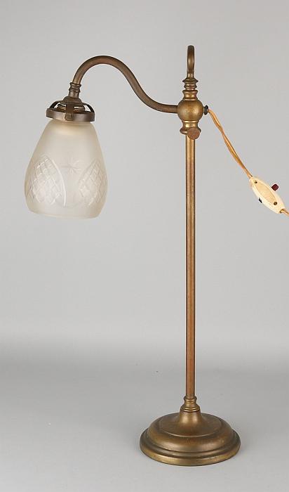 Antique brass desk lamp with faceted glass cap. (1 of 1)