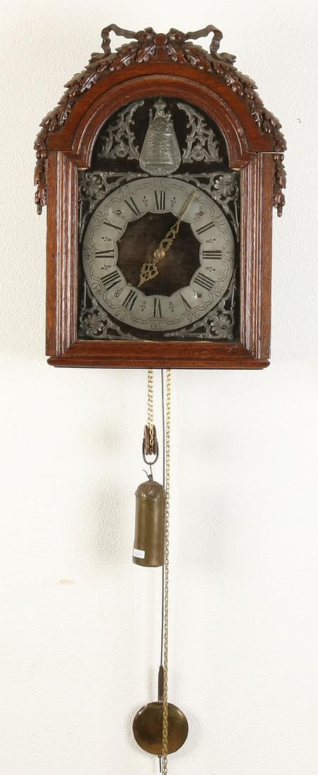 18th Century French Louis Seize oak wall clock. Pewter: 18th Century French Louis Seize oak wall clock. Pewter dial. With a weight movement. Day-runner, percussion large bell. Size: 54 x 40 x 20 cm. In good condition.