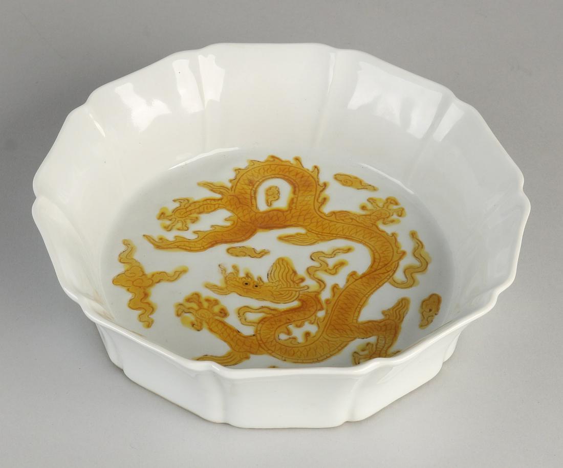 Chinese white glazed porcelain bowl with orange dragon (1 of 3)