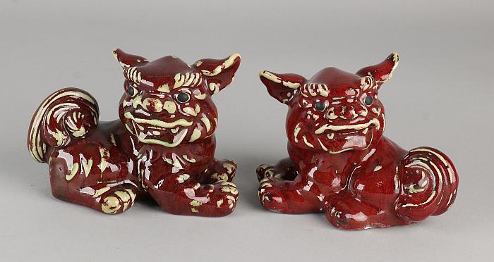 Two ancient Chinese porcelain Foo dogs with red enamel. (1 of 1)