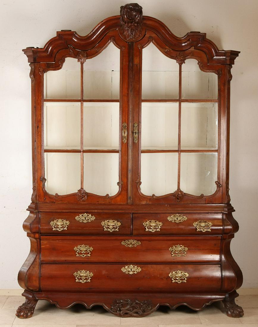 18th century Dutch teak Baroque display cabinet with: 18th century Dutch teak Baroque display cabinet with beautiful carving, claw feet and bronze fittings. Dimensions: 232 x 170 x 52 cm. In good condition.