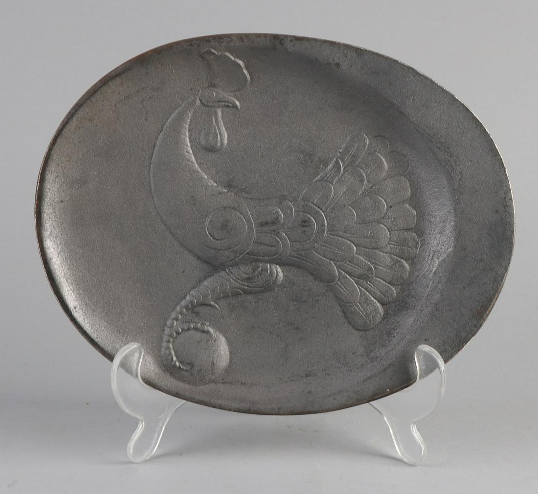Ewald Mataré. 1887 - 1965. Germany. Pseudonym HE: Ewald Mataré. 1887 - 1965. Germany. Pseudonym HE Schniewind. Cast iron Art Deco bowl with peacock. Dimensions: 18.5 x 23 x 1 cm. In good condition.
