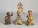 Three antique metal figures. Among others: once putti