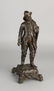 Antique composition metal figure. Fisherman with safety