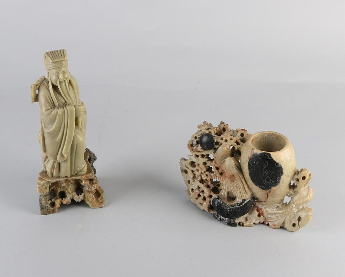 Antique Chinese soapstone emperor on rock. One chip at: Antique Chinese soapstone emperor on rock. One chip at hand. Size: 20 cm. And a soapstone piece with a vase, rock and bird decoration. Size: 11 x 18 cm. In fair / good condition.
