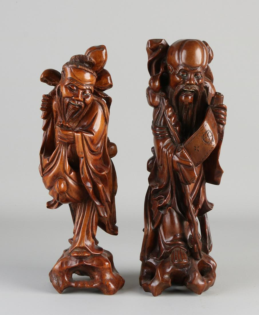 Two antique Chinese wood carved figures.  (1 of 1)