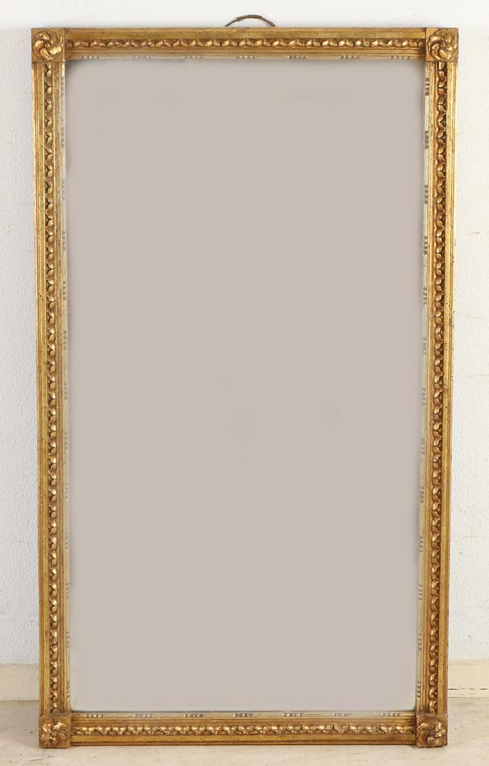 Early 19th century gilded wooden Louis Seize mirror: Early 19th century gilded wooden Louis Seize mirror with rosettes. Dimensions: H 103 x W 59 cm. In good condition.