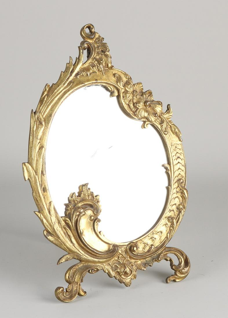 Antique gilt bronze toilet mirror with stand.  (1 of 1)