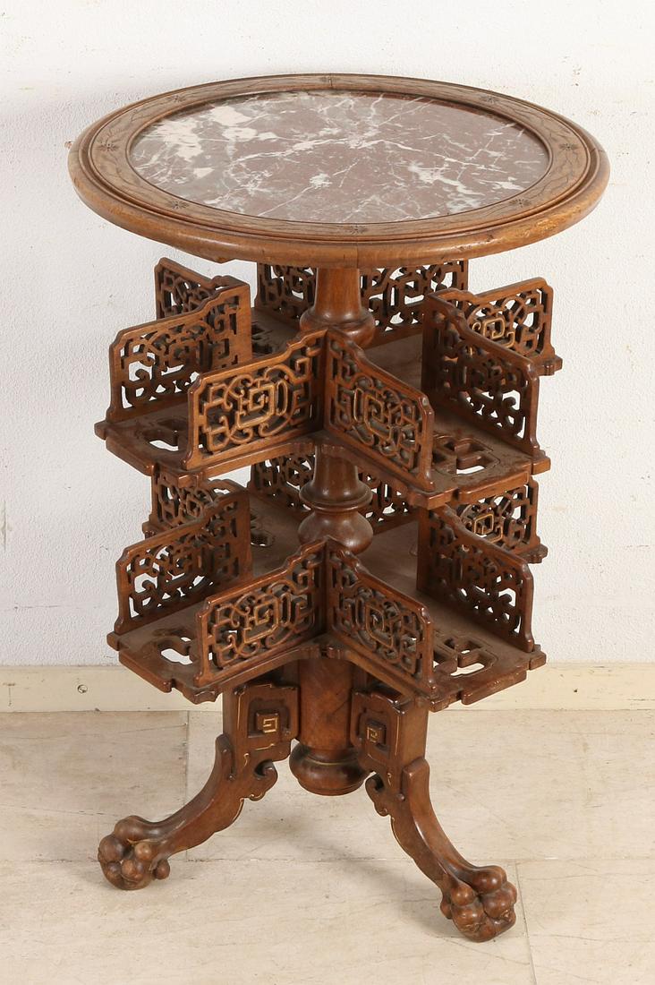 19th Century revolving hardwood etagere liqueur table: 19th Century revolving hardwood etagere liqueur table with Chinese carving, claw feet and brown marble top. Approx. 1870. Dimensions: H 78 x Ø 50 cm. In good condition.