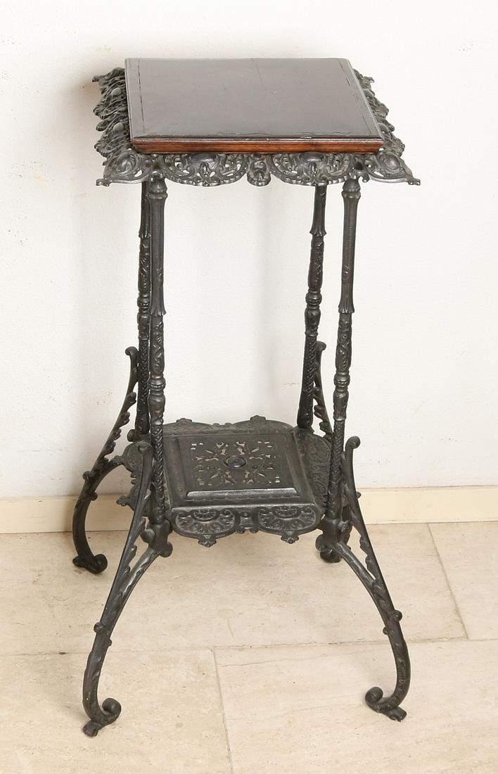 19th century cast iron historicism side table with (1 of 1)