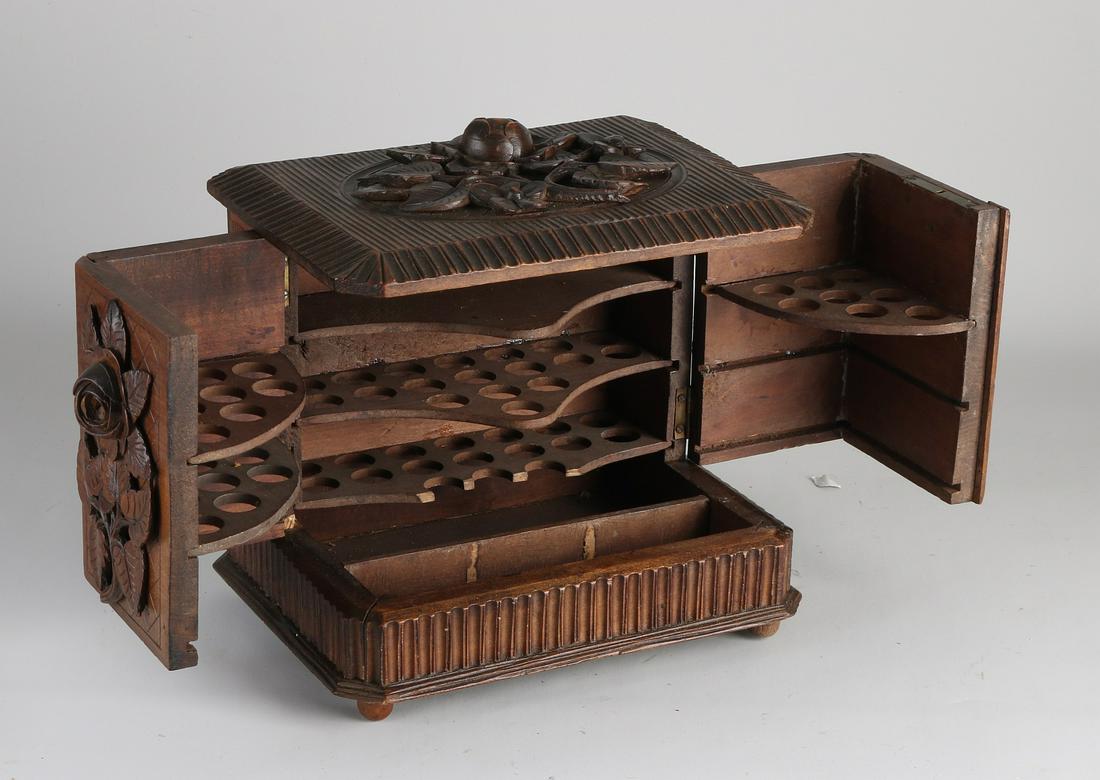 Walnut Schwarzwalder carving humidor with rose decor.