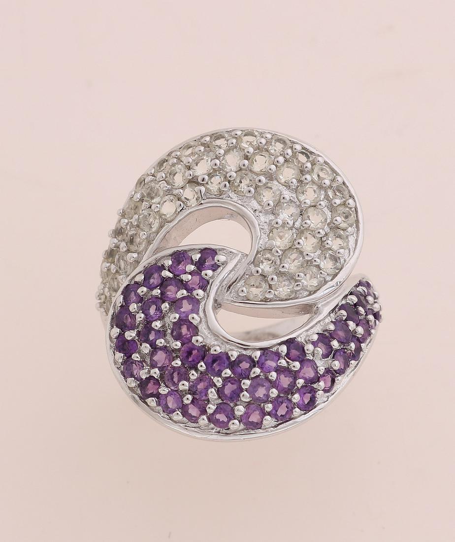 Silver ring, 925/000, half set with amethysts and half: Silver ring, 925/000, half set with amethysts and half set with lemon quartz, in 2 arches. The ring is rhodium plated. Ã¸ 56. head width 26 mm. New