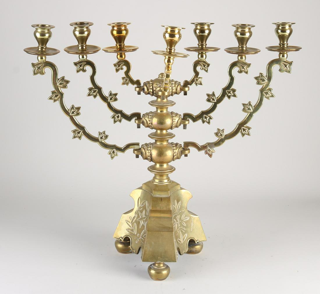 Antique German neo-gothic brass Hanukkah candlestick.: Antique German neo-gothic brass Hanukkah candlestick. seven-armed. With tendrils and fringe decor. Circa 1920. Arms can be disassembled. Dimensions: 45 x 48 x 17 cm. In good condition.