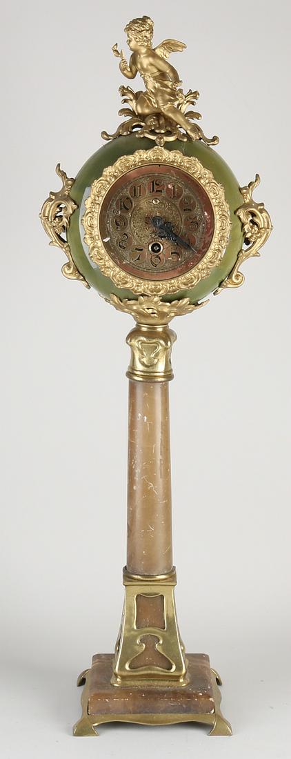 Large antique German Lenzkirch table clock. Onyx with: Large antique German Lenzkirch table clock. Onyx with porcelain and gilt brass. Circa 1900. One hand not original. Lenzkirch 1 million 182662. Movement starts. Dimensions: 67 cm. In fair/good conditio