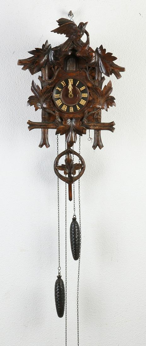 Antique German Junghans cuckoo clock. Circa 1920.: Antique German Junghans cuckoo clock. Circa 1920. Dimensions: 45 x 33 x 20 cm. In good condition.