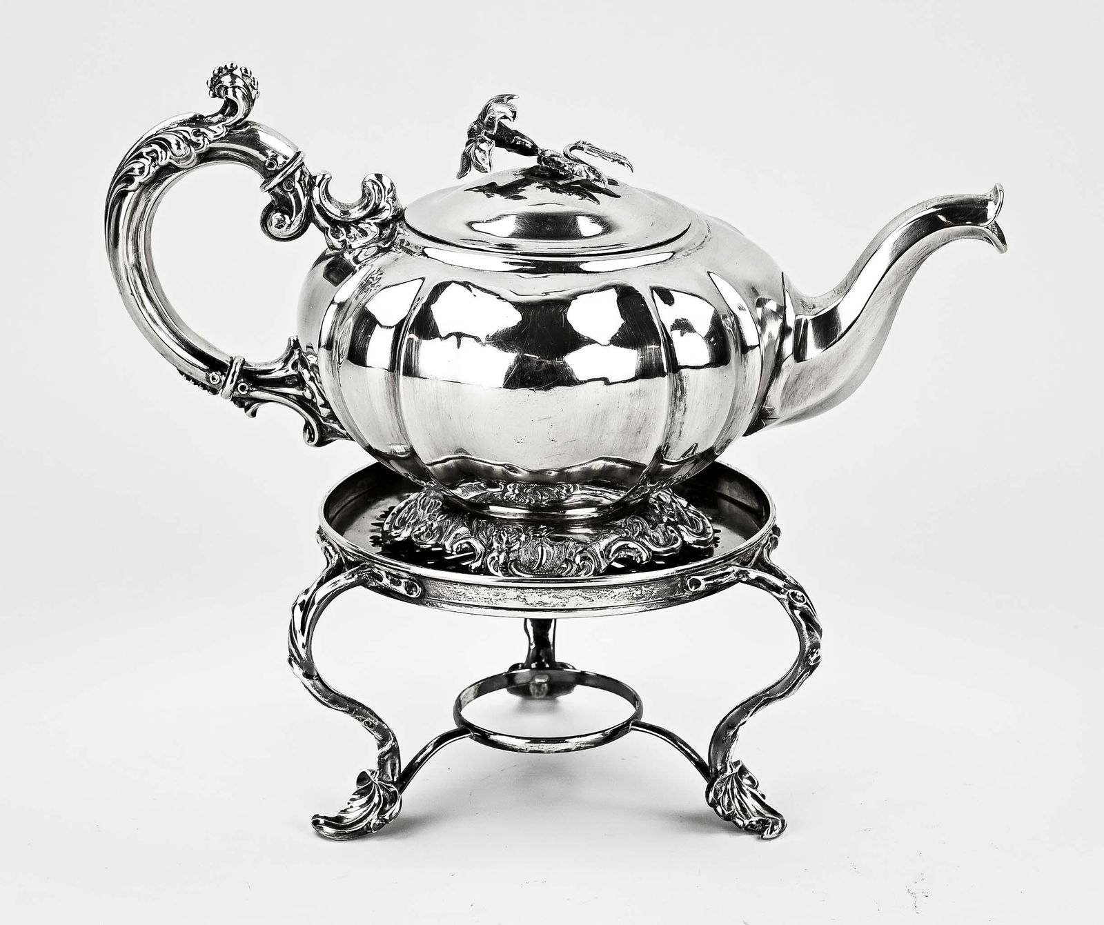 Silver teapot on stove (1 of 2)