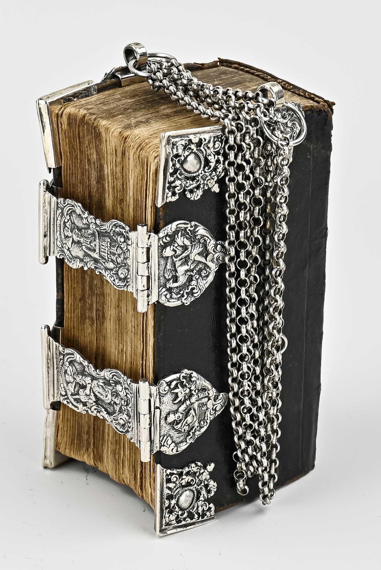 Antique state bible with silverware (1 of 1)