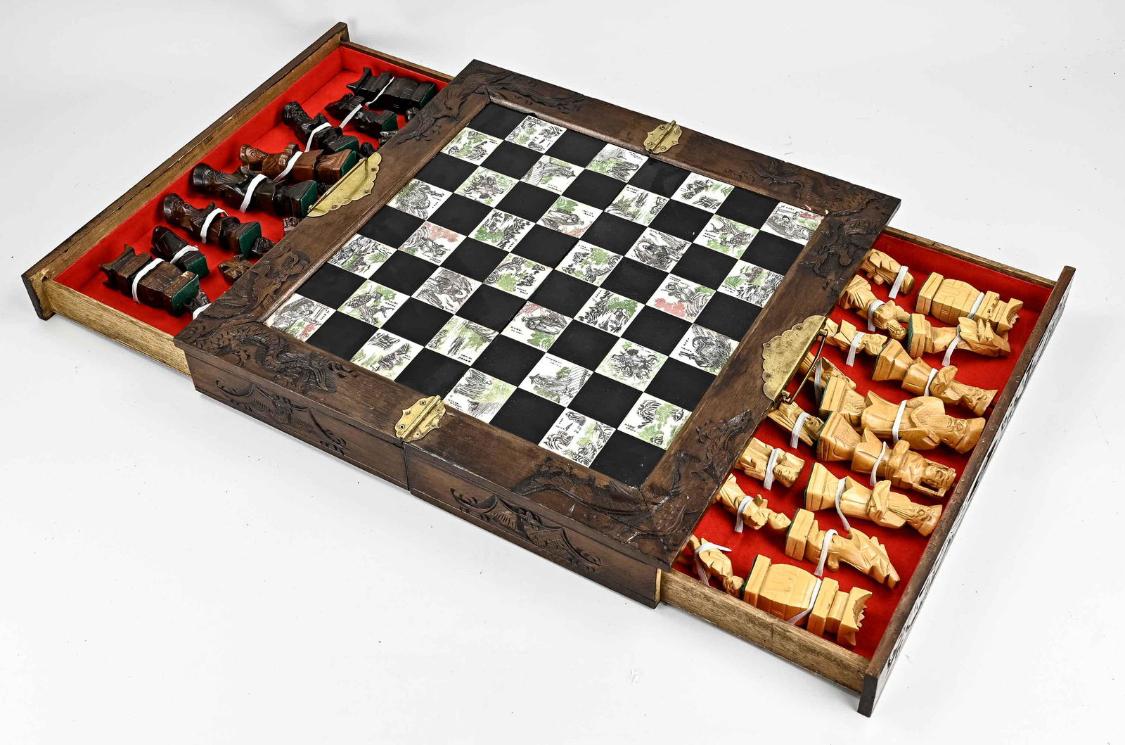 Ancient Chinese Chess Game: Old Chinese wood-carved chess set with wooden chess pieces. 20th century. Dimensions: 45 x 45 cm. In good condition.