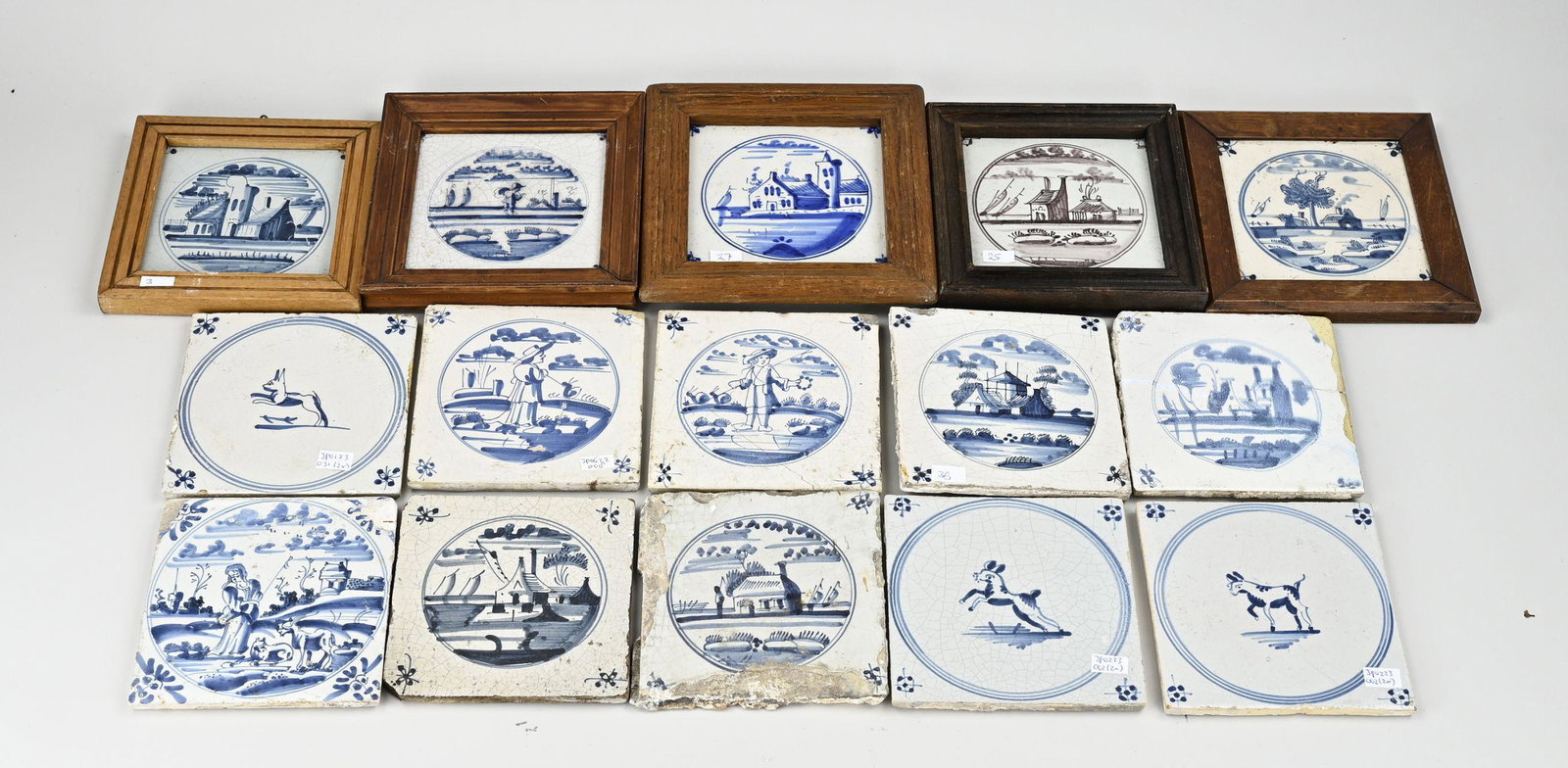 Lot of antique tiles (15 pcs.): Fifteen antique Dutch fayence medallion tiles. Mainly 18th century. With animals, figures, landscape decor. Some damage. Size: 13 x 13 cm. In fair/good condition.