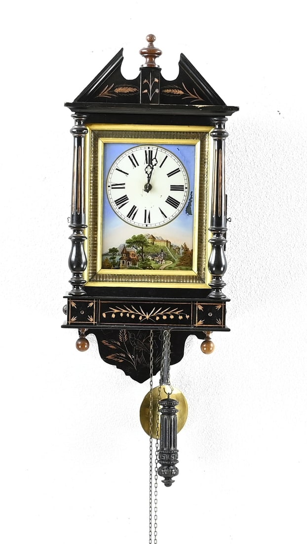 Black Forest Bismarck clock: Large 19th century German Black Forest Bismarck wall clock with half-hour strike. Dimensions: 60 cm. One chain is missing. Otherwise in good condition.