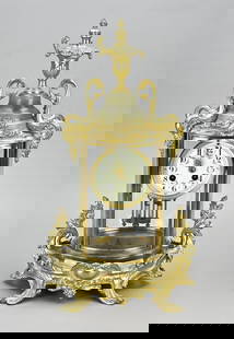 Antique French Samuel Marti glass mantel clock, 1900: Antique French Samuel Marti glass mantel clock with facet cut oval glass. Art Nouveau. Circa 1900. Eight-day movement, half-hour chime on gong spiral, folding pendulum. Dimensions: 50 cm. In good cond