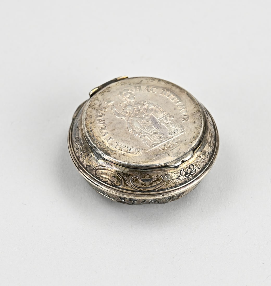 Silver antique pill box: Silver pill box, 800/000, made of a silver watch case, with a representation of figures on the back, 19th century or older. Lid is made of plate with a representation of a figure and the text: HANCTVE