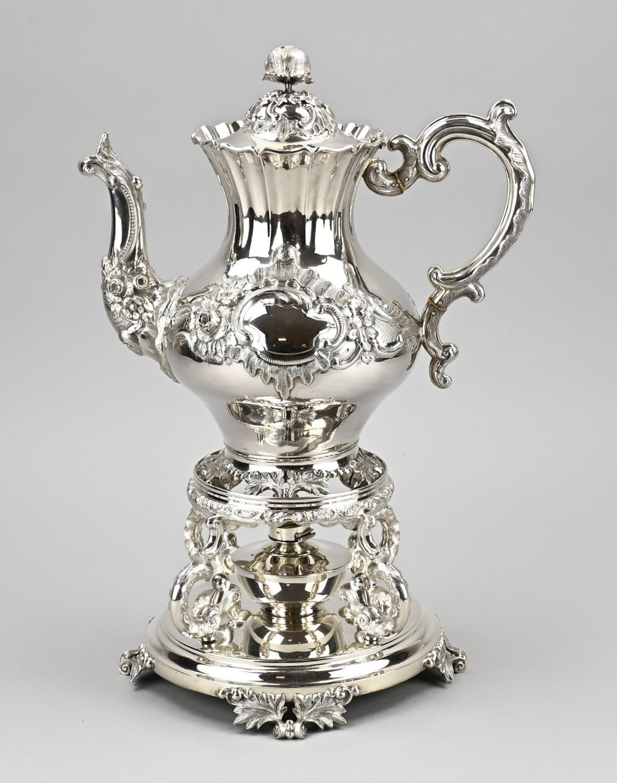 Very large silver teapot on burner (1 of 2)