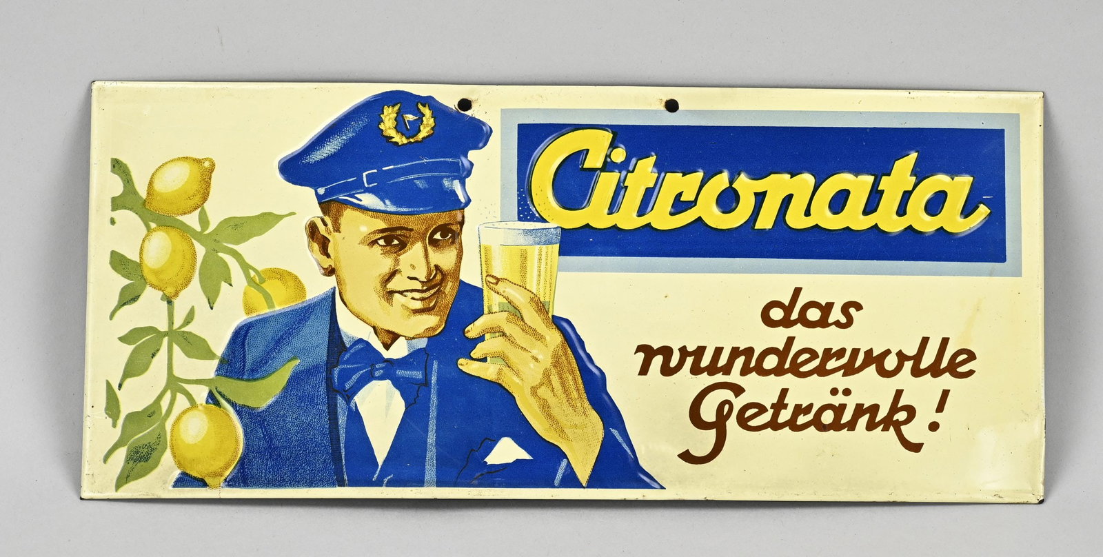 Citronata advertising board: Lithographed German tin advertising sign. Citronata Lemonade. 70s. Dimensions: H 16 x W 36 cm. In good condition.