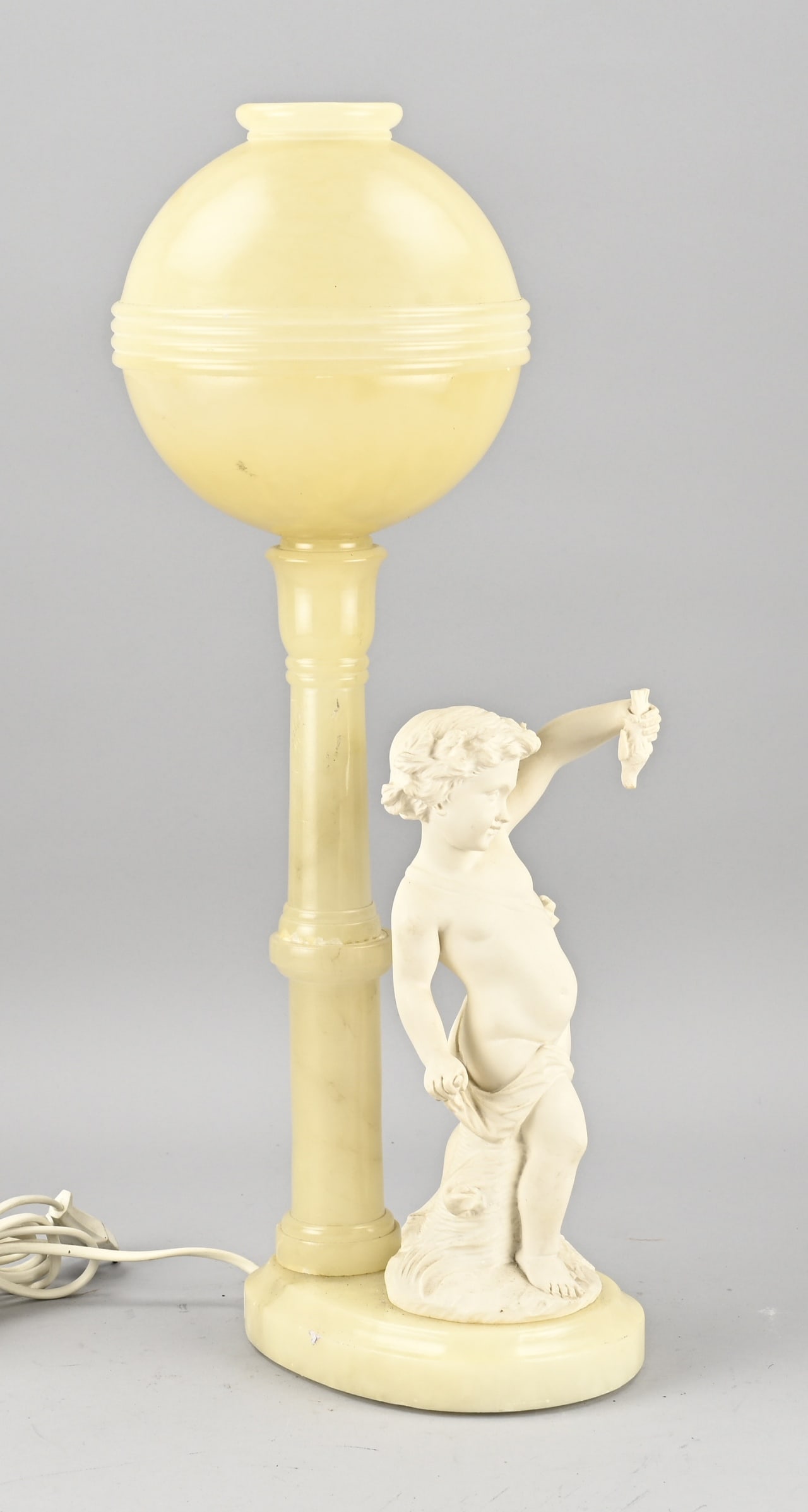 Alabaster table lamp, Figure with fish in hand: Alabaster table lamp. Depicting a figure with fish in its hand. Circa 1930. Dimensions: 54 x 19 cm. In good condition.