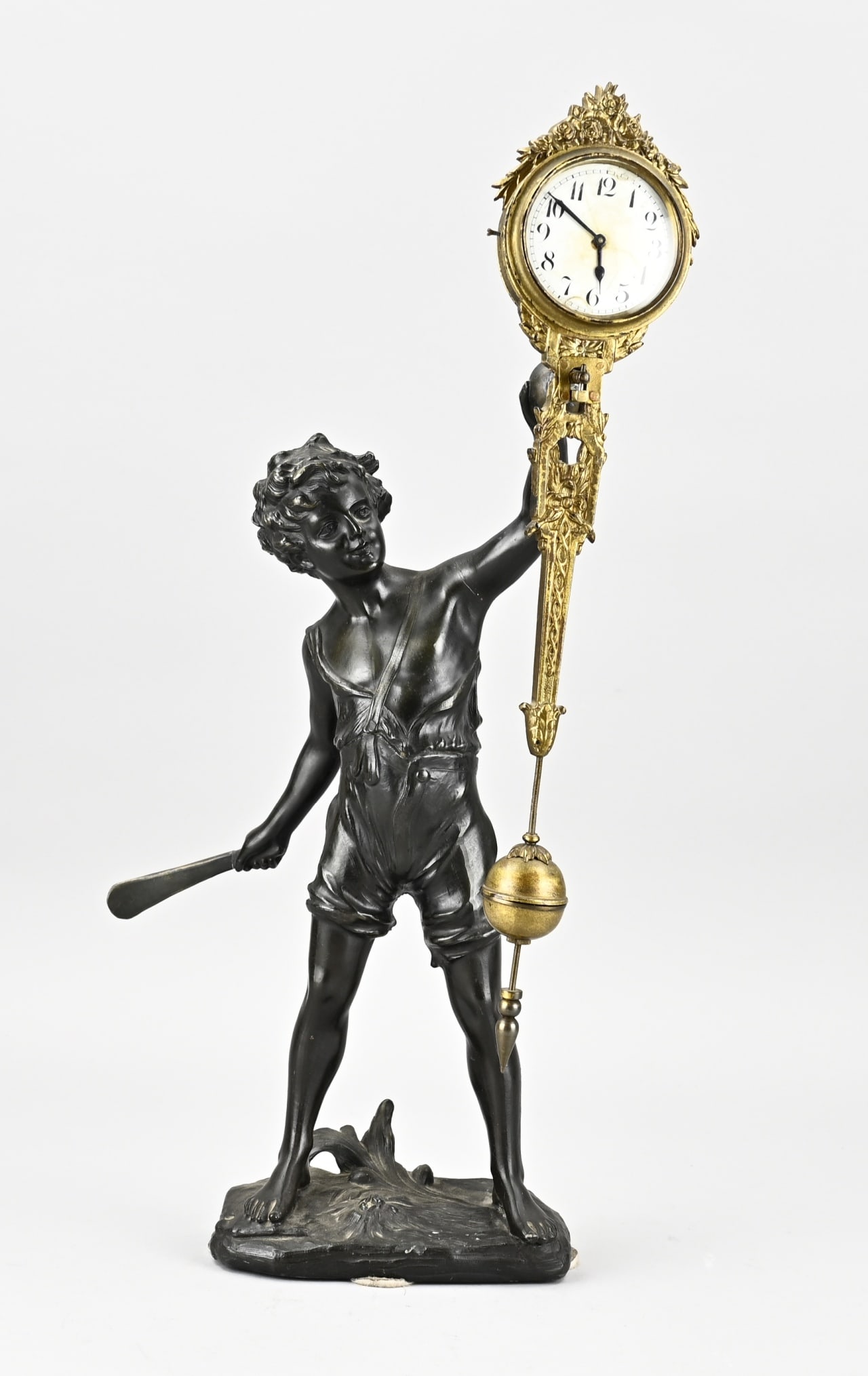 Mysterious pendulum, 1900: Antique Iffland mysterious clock. Circa 1900. Boy with club and ball. Composition metal. Club repaired. Needs attention. Size: 47.5 cm. In fair condition.