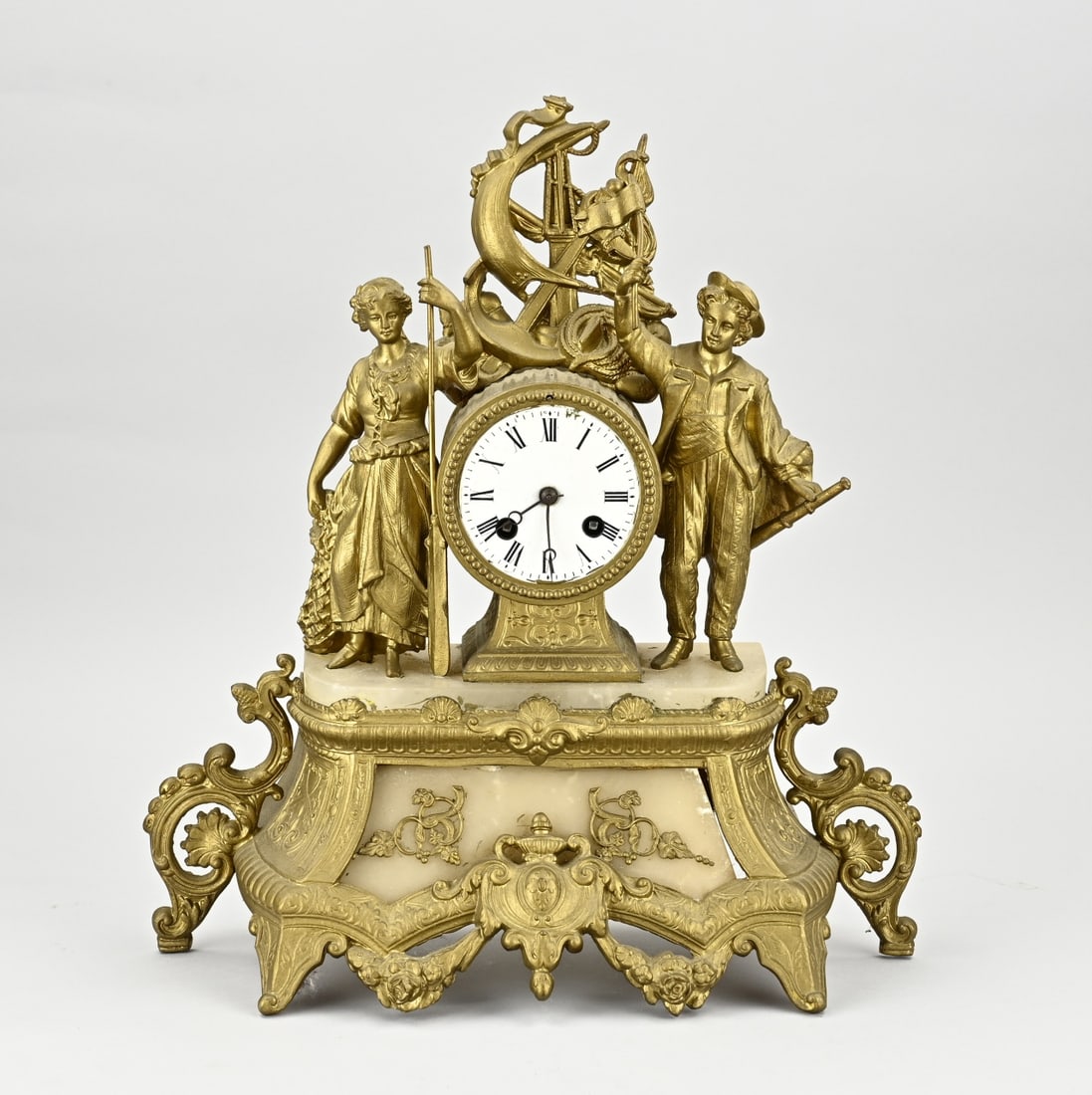 Louise Philippe pendulum, 1860: Antique Louise Philippe mantel clock of composition metal and alabaster. France. Circa 1860. Eight-day movement, half-hourly striking, spring pendulum. Size: 40 cm. In good condition.