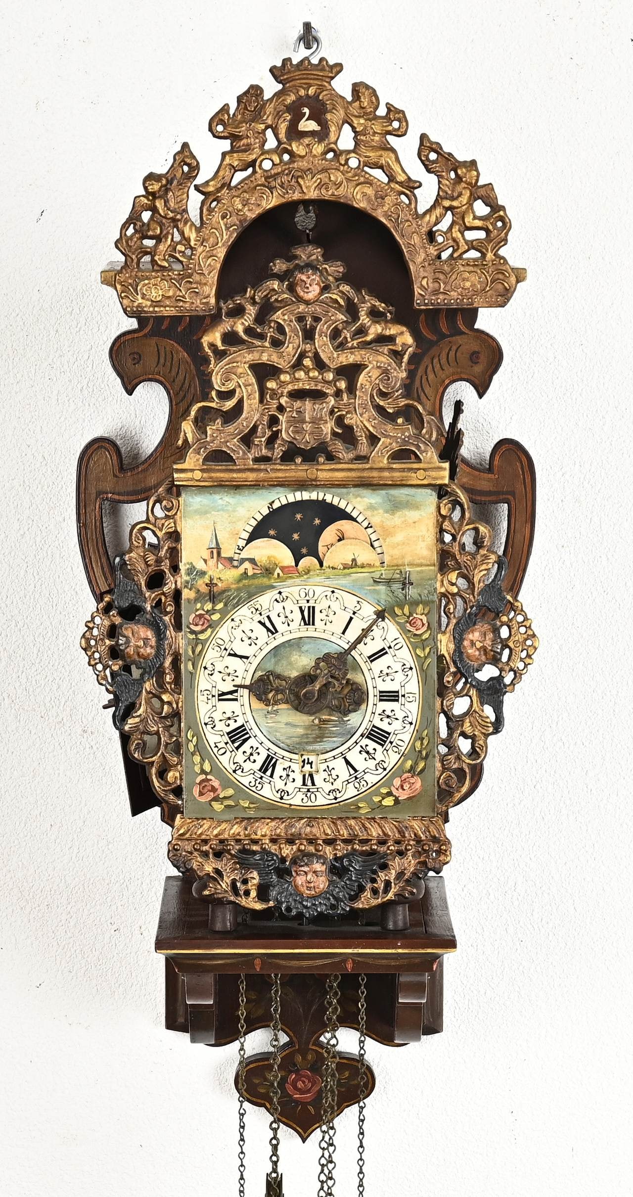 Frisian chair clock: Old Frisian chair clock with moon phase. Second half 20th century. Size: 73 cm. In good condition.