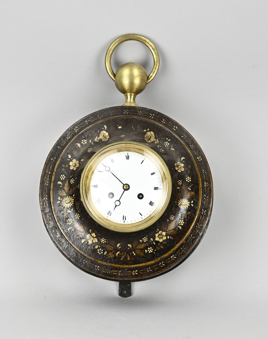 French wall clock, 1830: 19th century painted brass wall clock. France. Circa 1830. Eight-day movement, half-hourly striking, string pendulum. Dimensions: 13 x 29 x Ø 20 cm. In good condition.