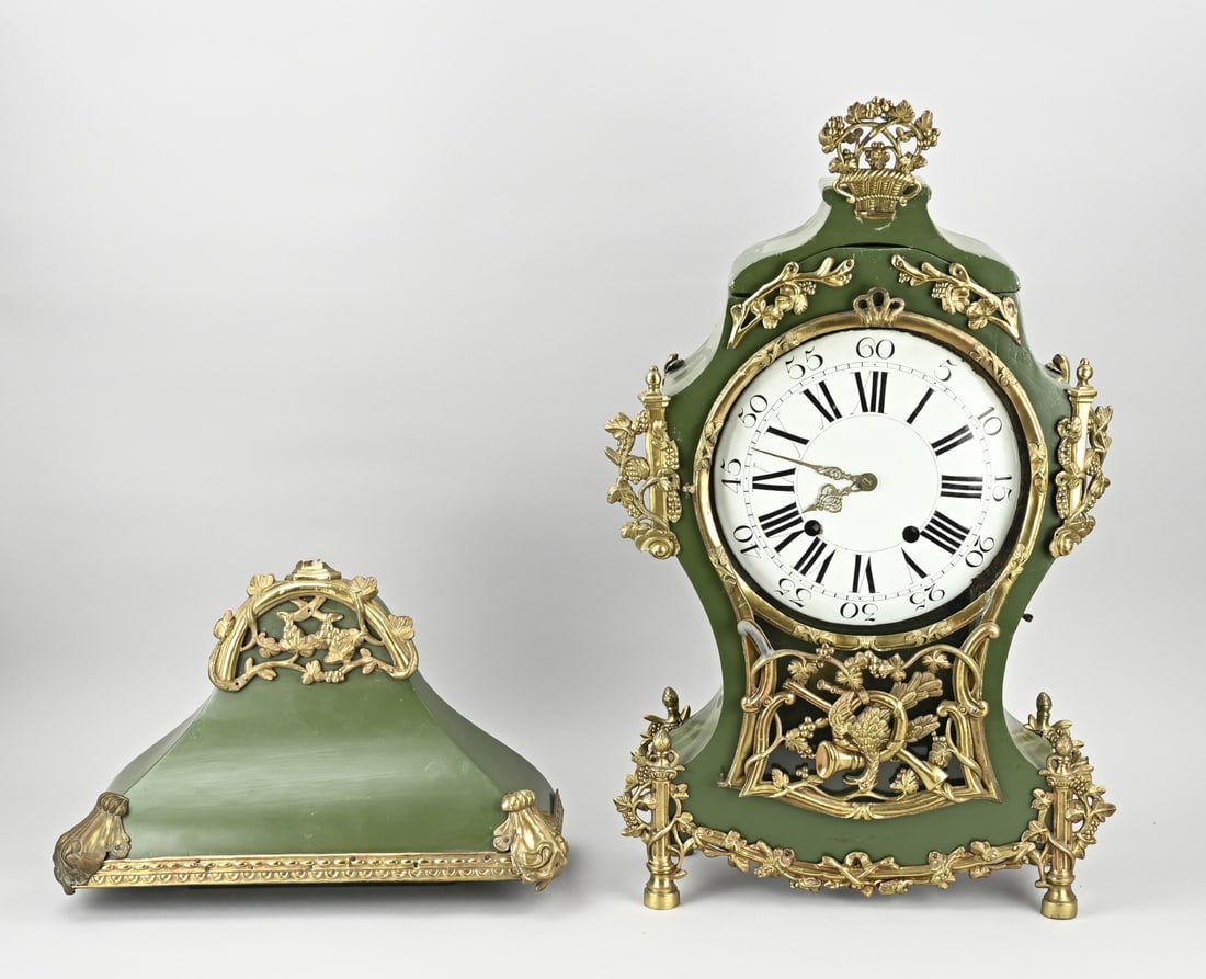 Swiss Neuchatel clock + console: 18th Century Swiss Neuchatel wall clock with console. Clock with verge escapement, brass fittings, and green polychromy. Eight-day movement, half-hourly striking, string pendulum. Dimensions: 92 cm.