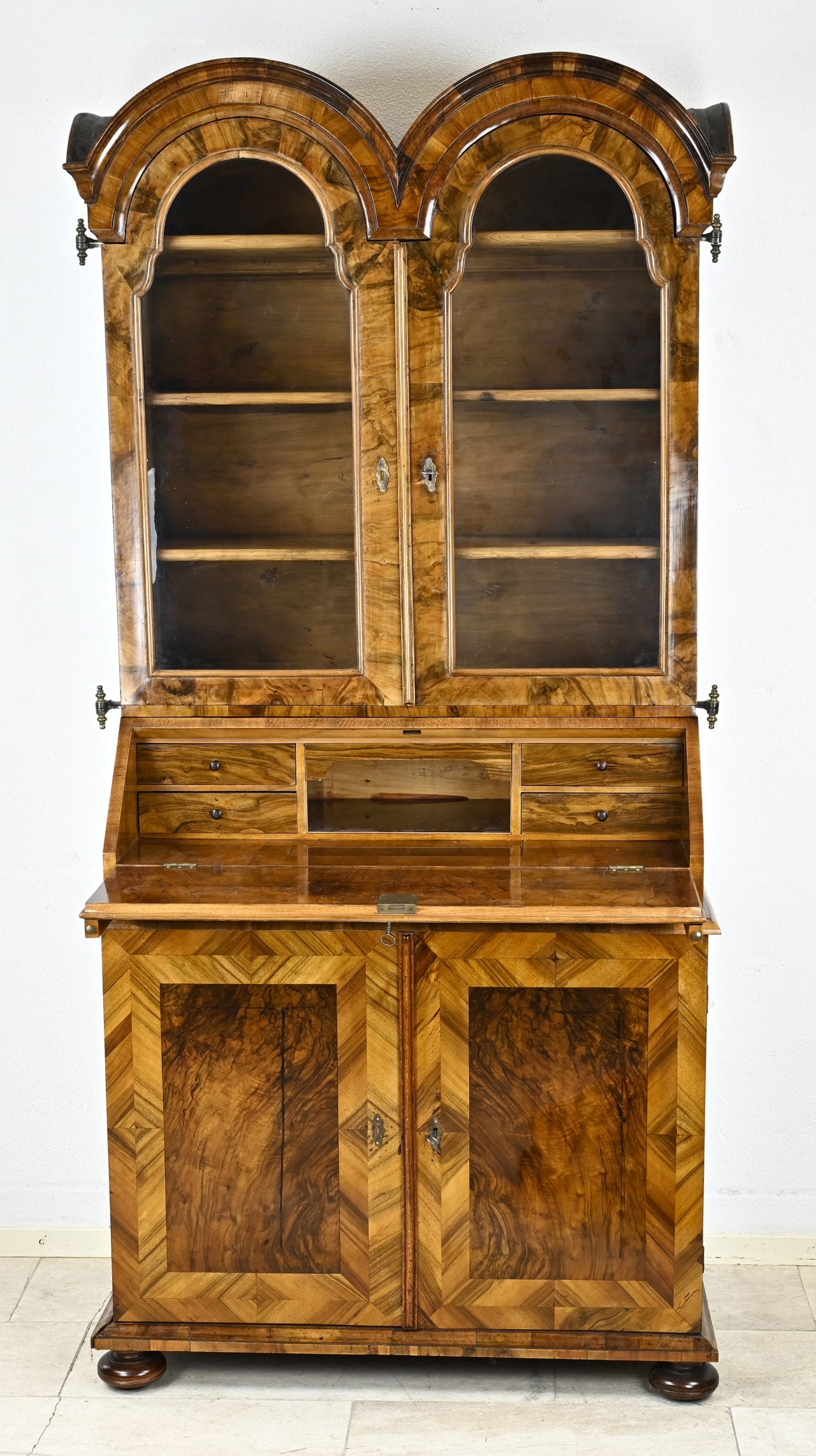 Secretary with intention (notes): 18th century, three-piece, German, walnut writing desk with double-curved headstocks. Recently professionally restored and polished. In very good condition. Dimensions: 210 x 57 x 105 cm.