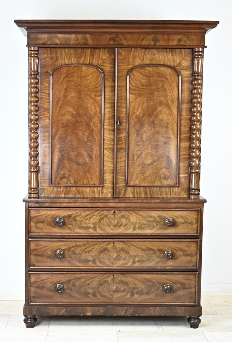English Cabinet, 1840: English, mahogany cabinet. Circa 1840. With two doors on top and twisted columns. Base with various drawers. Cabinet is divisible into three parts. Dimensions: 213 x 130 x 50 cm. In good condition.