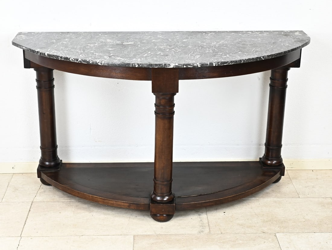 English half moon table, 1890: Mahogany half-moon table with three full columns and a marble top. England. Circa 1890. Dimensions: 74 x 135 x 55 cm. In good condition.