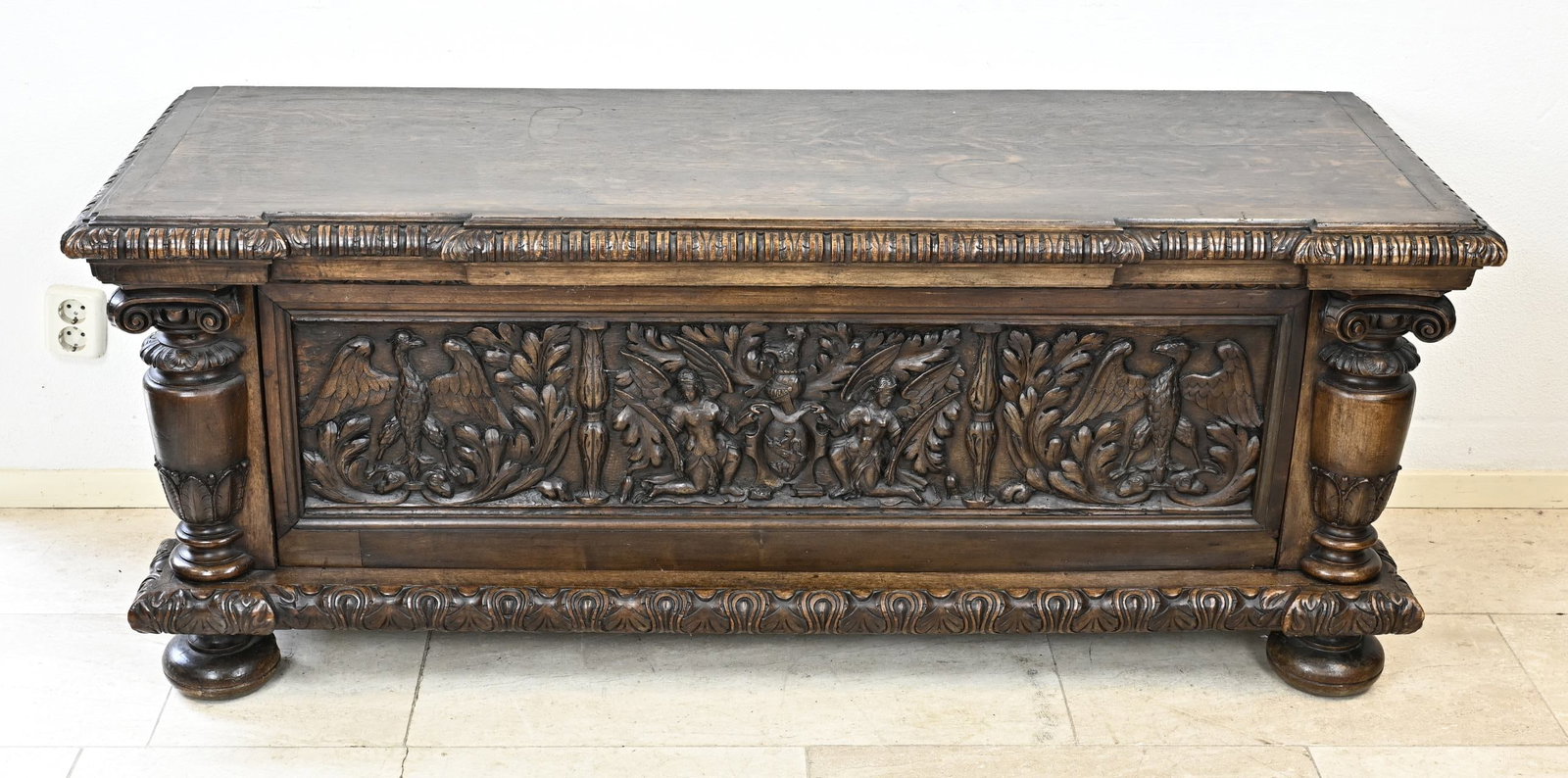 Box with carving: Oak chest with beautiful carving of bird/figures decor. Germany. 19th century. Dimensions: 63 x 162 x 55 cm. In good condition.