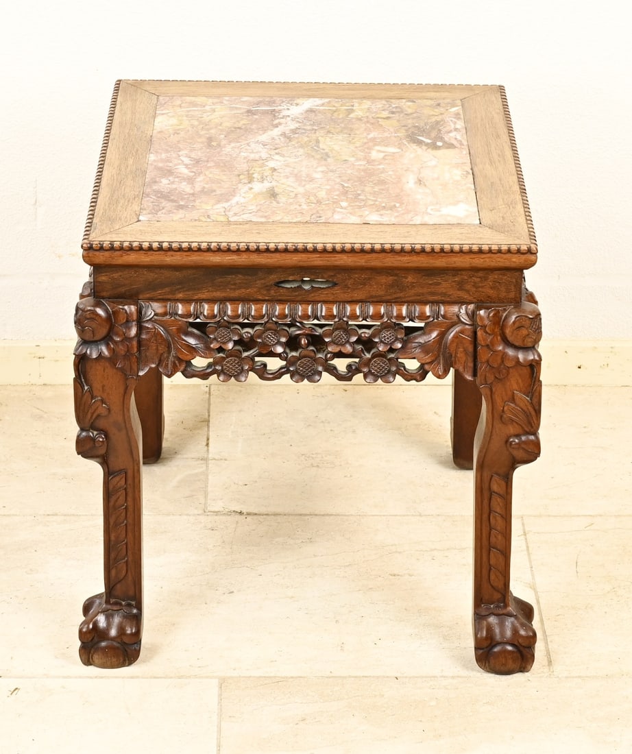Chinese side table: Hardwood carved Chinese footstool with marble top + claw feet. 20th century. Dimensions: 46 x 45 x 46 cm. In good condition.